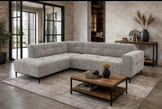 BOVINO CORNER SOFA WITH TAUPE FEATURING A MODREN CORNER DESIGN WITH COMFORTABLE SEATING AND ELEGANT UPHOLSTERY.