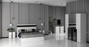 LUXY BEDROOM SET IN WHITE/BLACK FEATURES A MODREN AND ELEGANT DESIGN. THE SET INCLUDES BED 160X200CM  WITHOUT MATRESS AND 4 DOORS WARDROBE WITH 164X59X210CM AND DRESSING TABLE WITH 3 DRAWERS 100X44X77CM AND MIRROR AND 2 SIDETABLE 55X37X48CM