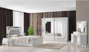 CRISTAL BEDROOM SET WITH WHITE/SILVER FEATURES A MODREN AND ELEGANT DESIGN . THE SET INCLUDES A 160X200CM BED WITHOUT MATRESS WITH 2 SLIDING DOOR WARDROBE 200X62X210CM AND COMMODE WITH LIGHT 125X47X161CM AND MIRROR  AND 2 BEDSIDE TABLE 60X47X51CM