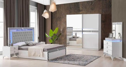 ALLIANCE BEDROOM SET IN WHITE/SILVER FEATURES MODREN AND ELEGANT DESIGN . THE SET INCLUDES 160X200CM BED  WITH SOMMIER AND WITHOUT MATRESS AND 2 SLIDING DOOR WARDROBE 200X30X210CM AND 3 DRAWERS COMMODE 90X45X80CM AND MIRROR AND 2 BEDSIDETABLE