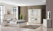 PARIS BEDROOM SET IN BEIGE/GOLD FEATURES A MODREN AND ELEGANT DESIGN . THE SET INCLUDES A 160X200CM BED WITHOUT MATRESS AND 4 DOORS WARDROBE 180X60X205CM AND 3 DRAWERS COMMODE 95X44X80CM AND MIRROR 70X2X80CM AND 2 BEDSIDETABLE 53X44X50CM