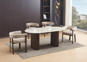 ROXY DINING TABLE FEATURES A WALNUT EFFECT BASE WITH GREY SHAKESPEARE CERAMIC TOP , COMBINING MODREN ELEGANCE AND DURABILITY . MEASURING 160X90X75CM