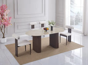 La mesa de comedor ROXY cuenta con una base de metal efecto nogal y una tapa de cerámica de travertino mate que combina elegancia moderna y durabilidad. Medidas: 180x90x75cm.