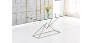 PYRAMIDE DINING TABLE FEATURES A SILVER BASE WITH A TRANSPARENT GLASS TOP COMBINING MODREN GEOMETRIC DESIGN AND ELEGANCE 150X90X75