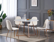HELOISE DINING ATBLE FEATURES A WHITE MARBLE TOP WITH ROSE GOLD LEGS COMBINING ELEGANT LUXURY WITH A MODREN DESIGN 120CM