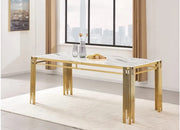 FLUTE DINING TABLE FEATURES A WHITE MARBLE TOP WITH GOLD LEGS COMBINING MODREN ELEGANCE DESIGN 180X90X75CM
