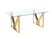 IGREC DINING TABLE FEATURES A TRANSPARENT GLASS TOP WITH A GOLD FEETS WITH MODREN DESIGN 180X90X75CM