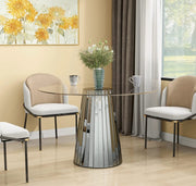 DISCO ROUND DINING TABLE FEATURES A TRANSPARENT GLASS TOP WITH A GREY MIRRORED BASE FEETS 120X75CM