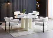 ANAIS 120 CM DINING TABLE FEATURES A WHITE MARBLE EFFCET CERAMIC TOP WITH BEIGE LEGS.