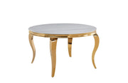 LA MESA DE COMEDOR REDONDA RONDE DE 130X75CM PRESENTA UN EFECTO DE MÁRMOL BLANCO CON PATAS DORADAS.