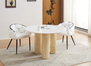 ANAIS 120CM DINING TABLE FEATURES A BLANCO MARBLE EFFECT TOP WITH TRAVERTINE LEGS.
