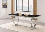LA MESA DE COMEDOR OMEGA DE 180X90CM CUENTA CON UNA TAPA DE MÁRMOL NEGRO Y PIES DE BASE PLATEADA.