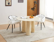 ANAIS 120CM DINING TABLE FEATURES A BEIGE MARBLE EFFECT TOP WITH TRAVERTINE LEGS.