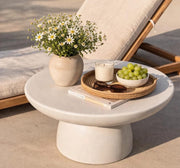 GALET , FIBRE DE VEERE 70X34CM COFFE TABLE FEATURES A REINFORCED FIBERGLASS STRUCTURE WITH A MATTE TRAVERTINE EFFECT FINISH.