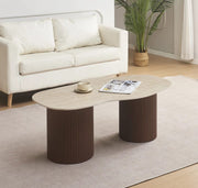 NIKI 120X70X45CM COFFEE TABLE FEATURES A MATTE TRAVERTINE EFFECT CERAMIC TOP WITH A WALNUT STYLE FEETS.