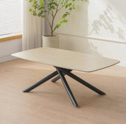 NYSA 120X70X45CM COFFEE TABLE FEATURES A TRAVERTINE EFFECT CERAMIC TOP WITH A BLACK METAL FEETS.