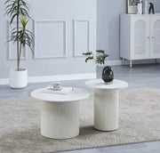 NESTING COFFEE TABLE SET FEATURES A WHITE MARBLE EFFECT CERAMIC TOP WITH BEIGE POIPO STYLE LEGS .