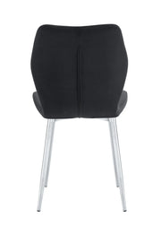 SILLÓN SHELL CON PATAS PLATEADAS EN TERCIOPELO NEGRO.