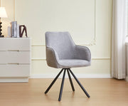 SILLAS LOLA CON PATAS DE METAL NEGRO Y ASIENTO DE TELA GRIS.