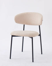 LULU CHAIRS WITH BLACK METAL LEGS IN BEIGE RIBBED FABRIC.