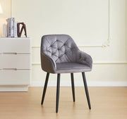 JADE CHAIR WITH BLACK METAL LEGS IN GREY VELVET SEAT.