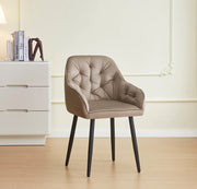 JADE CHAIR WITH BLACK METAL LEGS IN TAUPE VELVET SEAT.
