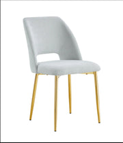 SILLAS AVA CON PATAS PLATEADAS Y TAPIZADO EN SARGA GRIS. MEDIDAS: 50X45X81.5CM