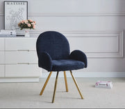 MIMI ARMCHAIR WITH GOLD FEETS IN BLUE.