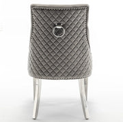 QUILTED STUDDED RING CHAIRS WITH SILVER FEETS AND ANTHRACITE VELVET.