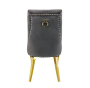 STUDDED RING CHAIR IN ANTHRACITE VELVET AND GOLD FINISHING.
