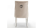 SILLÓN ANILLO ACOLCHADO EN TERCIOPELO BEIGE Y PATAS PLATEADAS.