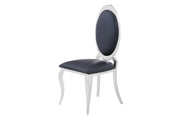 SILLÓN ÁNGEL CON CUERO NEGRO Y ACABADO Y PATAS PLATEADAS.