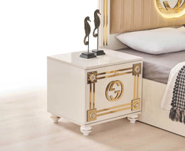 GUCCI BEDSIDE TABLE IN BEIGE AND GOLD FINISH WITH 2 DRAWERS .MEASURING 60X50CM