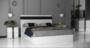 LUXY BED IN BLACK AND WHITE COLOR .MEASURING 160X200CM.WITHOUT MATRESS.WITH SOMMIER,CANAPE.