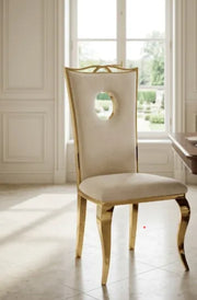 ROYAL CHAIR WITH GOLD LEGS AND BEIGE VELVET SEAT.