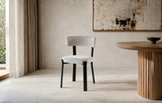 NORDIK CHAIR WITH BLACK LEGS AND BEIGE VELVET SEAT.
