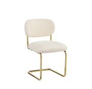 ARC CHAIR WITH GOLD LEGS AND BEIGE MARBELLA FABRIC UPHOLSTERY.