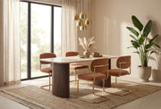 ARC CHAIR WITH GOLD LEGS AND TERRACOTTA MARBELLA FABRIC UPHOLSTERY.