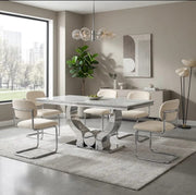 ARC CHAIR WITH SILVER LEGS AND BEIGE MARBELLA FABRIC UPHOLSTERY.