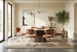 ARC CHAIR WITH SILVER LEGS AND TERRACOTTA MARBELLA FABRIC UPHOLSTERY.