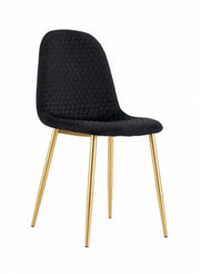 SCANDINAVAIN ALVEOLE CHAIR WITH GOLD LEGS AND BLACK VELVET UPHOLSTERY.