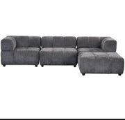 A LARGE DARK GRAY SECTIONAL SOFA WITH ROUNDED ARMS. MEASUREMENT 280X186CM