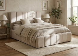 A BEIGE COLORED BED WITH SOMMIER AND GIVING AN ELEGANT LOOK . MEASUREMENT 160X200CM