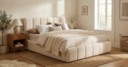 A BED IN DOUDOU FABRIC WITH SOMMIER AND ELEGANT LOOK. MEASUREMENT 160X200CM