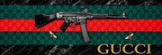 A BLACK RIFLE ON A GUCCI STYLE PATTERNED BACKGROUND. MEASUREMENT 180X60CM