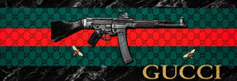A BLACK RIFLE ON A GUCCI STYLE PATTERNED BACKGROUND. MEASUREMENT 180X60CM