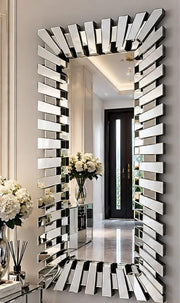 A MODREN DECORATIVE MIRROR MEASURING 160X70CM , FEATURING A GEOMETRIC MIRRORED FRAME. MEASURING 160X70CM
