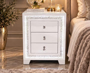 A MODREN BEDSIDE TABLE IN WHITE WITH DIAMOND DESIGN WITH LIGHTS AND 3 DRAWERS. MEASUREMENT 45X40X60CM