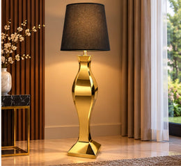 A LUXURY GOLD FLOOR LAMP WITH A BLACK FABRIC SHADE AND CURVED METALLIC FEETS. MEASUREMENT  52X52X170CM