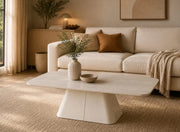 A COFFEE TABLE IN TRAVERTINE FINISH WITH WOODEN TOP AND METAL BASE . MEASUREMENT 120X70X45CM